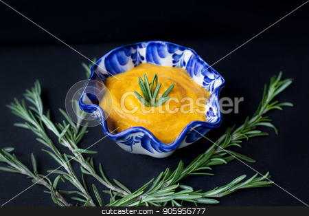 To use this stock image in your creative project, please select the size you need over to the right and click the "Add to Cart" button.
Your downloaded image will come with the Cutcaster watermark removed so don’t worry about the watermark you see on this page. delicious pumpkin cream soup and black background with rosemary stock photo, delicious pumpkin cream soup and black background with rosemary. by Sergiy Artsaba