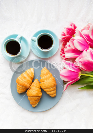 To use this stock image in your creative project, please select the size you need over to the right and click the "Add to Cart" button.
Your downloaded image will come with the Cutcaster watermark removed so don’t worry about the watermark you see on this page. two cups of coffee, croissants and a bouquet of pink tulips, beautiful morning stock photo, two cups of coffee, croissants and a bouquet of pink tulips, beautiful morning. by Sergiy Artsaba