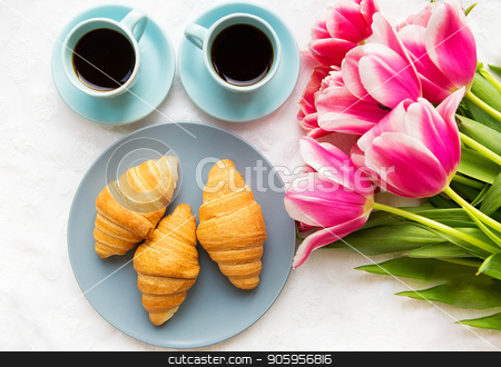 To use this stock image in your creative project, please select the size you need over to the right and click the "Add to Cart" button.
Your downloaded image will come with the Cutcaster watermark removed so don’t worry about the watermark you see on this page. two cups of coffee, croissants and a bouquet of pink tulips, beautiful morning stock photo, two cups of coffee, croissants and a bouquet of pink tulips, beautiful morning. by Sergiy Artsaba
