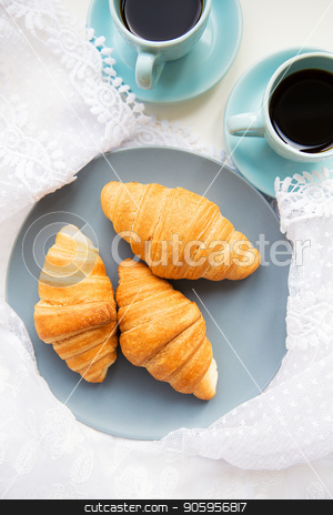 To use this stock image in your creative project, please select the size you need over to the right and click the "Add to Cart" button.
Your downloaded image will come with the Cutcaster watermark removed so don’t worry about the watermark you see on this page. cup of coffee with croissant stock photo, two cups of coffee with croissants on the background laces by Sergiy Artsaba