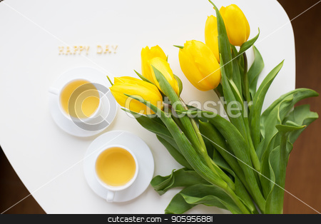 To use this stock image in your creative project, please select the size you need over to the right and click the "Add to Cart" button.
Your downloaded image will come with the Cutcaster watermark removed so don’t worry about the watermark you see on this page. beautiful yellow tulips stock photo, Beautiful yellow tulips on the table, the inscription happy day by Sergiy Artsaba