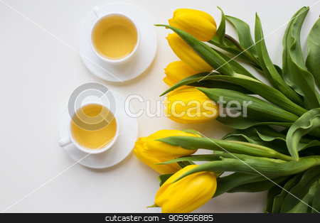 To use this stock image in your creative project, please select the size you need over to the right and click the "Add to Cart" button.
Your downloaded image will come with the Cutcaster watermark removed so don’t worry about the watermark you see on this page. beautiful yellow tulips stock photo, beautiful yellow tulips, two cups of green tea, spring by Sergiy Artsaba