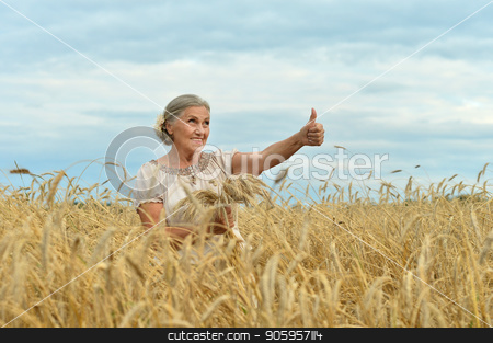 To use this stock image in your creative project, please select the size you need over to the right and click the "Add to Cart" button.
Your downloaded image will come with the Cutcaster watermark removed so don’t worry about the watermark you see on this page. senior woman in summer field stock photo, Portrait of a senior woman showing thumb up in summer wheat field by Ruslan Huzau