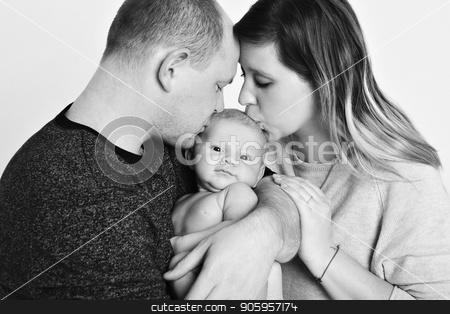 To use this stock image in your creative project, please select the size you need over to the right and click the "Add to Cart" button.
Your downloaded image will come with the Cutcaster watermark removed so don’t worry about the watermark you see on this page. newborn baby lying on the hands of parents stock photo, newborn baby lying on the hands of parents by aaalll3110