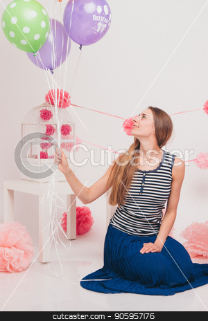 To use this stock image in your creative project, please select the size you need over to the right and click the "Add to Cart" button.
Your downloaded image will come with the Cutcaster watermark removed so don’t worry about the watermark you see on this page. blonde with colored balls on white background. Studio portrait of an attractive girl on the day of the holiday. stock photo, blonde with colored balls on white background. Studio portrait of an attractive girl on the day of the holiday. by aaalll3110