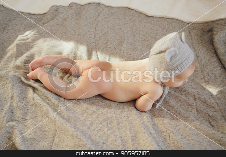 To use this stock image in your creative project, please select the size you need over to the right and click the "Add to Cart" button.
Your downloaded image will come with the Cutcaster watermark removed so don’t worry about the watermark you see on this page. naked newborn baby lying on his tummy in a knitted hat. Little boy on grey background. Advertising prevention in medicine: clean baby skin, hygiene of intimate places stock photo, naked newborn baby lying on his tummy in a knitted hat. Little boy on grey background. Advertising prevention in medicine: clean baby skin, hygiene of intimate places by aaalll3110