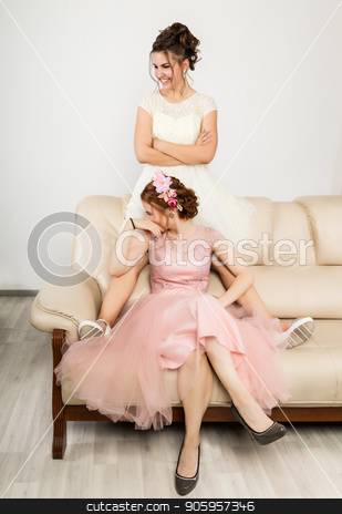 To use this stock image in your creative project, please select the size you need over to the right and click the "Add to Cart" button.
Your downloaded image will come with the Cutcaster watermark removed so don’t worry about the watermark you see on this page. Two happy beautiful young women in elegant dresses, tender history stock photo, Two happy beautiful young women in elegant dresses, tender history. by Alexander
