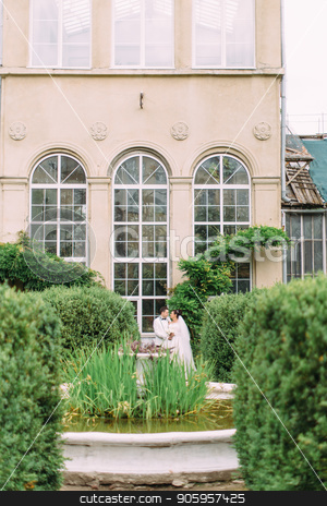 To use this stock image in your creative project, please select the size you need over to the right and click the "Add to Cart" button.
Your downloaded image will come with the Cutcaster watermark removed so don’t worry about the watermark you see on this page. Full-length view of the newlyweds standing near the old building in the garden. stock photo, Full-length view of the newlyweds standing near the old building in the garden by Andrii Kobryn
