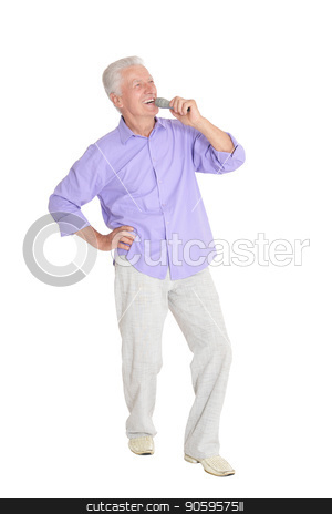 To use this stock image in your creative project, please select the size you need over to the right and click the "Add to Cart" button.
Your downloaded image will come with the Cutcaster watermark removed so don’t worry about the watermark you see on this page. mature man with microphone stock photo, Senior man singing with microphone posing against white background by Ruslan Huzau