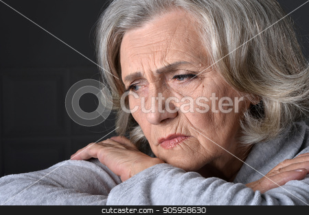 To use this stock image in your creative project, please select the size you need over to the right and click the "Add to Cart" button.
Your downloaded image will come with the Cutcaster watermark removed so don’t worry about the watermark you see on this page. Close up portrait of tired senior woman stock photo, Close up portrait of tired senior woman at home by Ruslan Huzau
