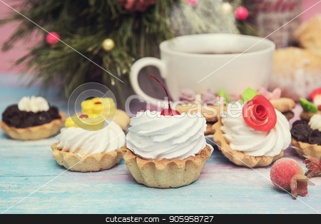 To use this stock image in your creative project, please select the size you need over to the right and click the "Add to Cart" button.
Your downloaded image will come with the Cutcaster watermark removed so don’t worry about the watermark you see on this page. Xmas cookie on table stock photo, Tasty cookie on a fir-tree background by olinchuk