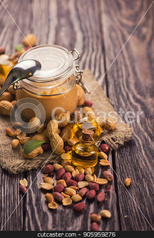 To use this stock image in your creative project, please select the size you need over to the right and click the "Add to Cart" button.
Your downloaded image will come with the Cutcaster watermark removed so don’t worry about the watermark you see on this page. Natural peanut butter stock photo, Natural peanut butter with oil in a glass jar and peanuts by olinchuk