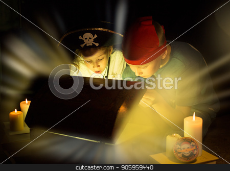 To use this stock image in your creative project, please select the size you need over to the right and click the "Add to Cart" button.
Your downloaded image will come with the Cutcaster watermark removed so don’t worry about the watermark you see on this page. Cute girl and adventurous boy found a treasures. Happy young pirates. stock photo, Childhood dreams. Cute girl and adventurous boy found a treasures. Happy young pirates. by Alfira Poyarkova