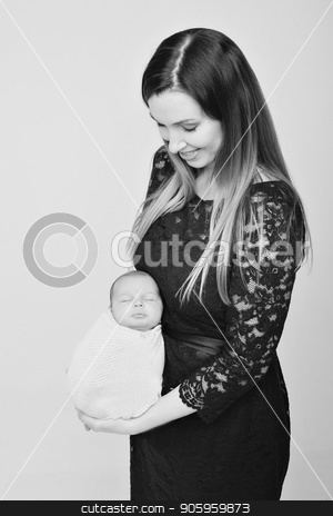 To use this stock image in your creative project, please select the size you need over to the right and click the "Add to Cart" button.
Your downloaded image will come with the Cutcaster watermark removed so don’t worry about the watermark you see on this page. baby on the hands of mother. woman and child stock photo, baby on the hands of mother. woman and child by aaalll3110