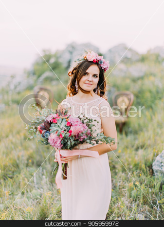 To use this stock image in your creative project, please select the size you need over to the right and click the "Add to Cart" button.
Your downloaded image will come with the Cutcaster watermark removed so don’t worry about the watermark you see on this page. Half-length portrait of the smiling bride with the wedding bouquet in the mountains. stock photo, Half-length portrait of the smiling bride with the wedding bouquet in the mountains by Andrii Kobryn