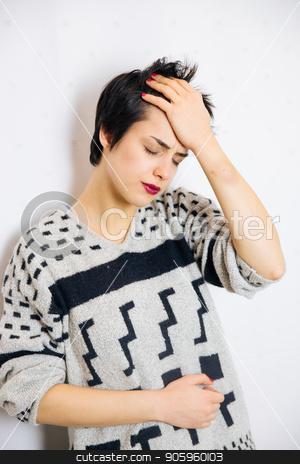 To use this stock image in your creative project, please select the size you need over to the right and click the "Add to Cart" button.
Your downloaded image will come with the Cutcaster watermark removed so don’t worry about the watermark you see on this page. Anxious and depressed woman stock photo, Portrait of young upset and stressed woman standing near the wall with headache and lot of problems. by Vera Arsic