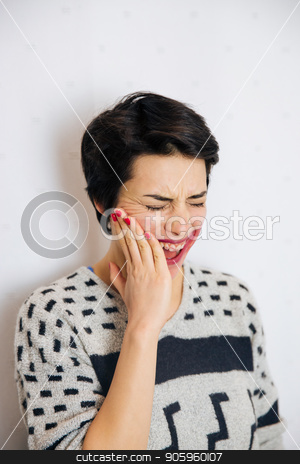 To use this stock image in your creative project, please select the size you need over to the right and click the "Add to Cart" button.
Your downloaded image will come with the Cutcaster watermark removed so don’t worry about the watermark you see on this page. Anxious and depressed woman stock photo, Portrait of young upset and stressed woman standing near the wall with toothache and lot of problems. by Vera Arsic