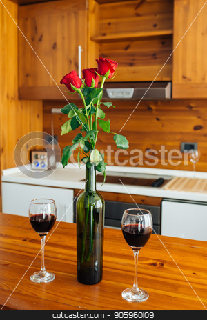 To use this stock image in your creative project, please select the size you need over to the right and click the "Add to Cart" button.
Your downloaded image will come with the Cutcaster watermark removed so don’t worry about the watermark you see on this page. Ready For Anniversary stock photo, Three Red Roses In Bottle And Two Glasses Of Red Wine On Wooden Table by Vera Arsic