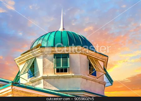 To use this stock image in your creative project, please select the size you need over to the right and click the "Add to Cart" button.
Your downloaded image will come with the Cutcaster watermark removed so don’t worry about the watermark you see on this page. Green Dome on Blue stock photo, an old cupola with a green roof against a blue sky by Darryl Brooks