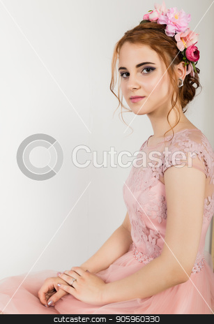 To use this stock image in your creative project, please select the size you need over to the right and click the "Add to Cart" button.
Your downloaded image will come with the Cutcaster watermark removed so don’t worry about the watermark you see on this page. cute young woman in delicate pink dress sits on sofa, professional hairstyle with wreath. stock photo, cute young woman in delicate pink dress sits on sofa, professional hairstyle with wreath by Alexander