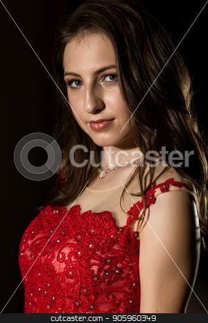 To use this stock image in your creative project, please select the size you need over to the right and click the "Add to Cart" button.
Your downloaded image will come with the Cutcaster watermark removed so don’t worry about the watermark you see on this page. Sensual beautiful young woman posing in red dress in dark room. professional make-up stock photo, Sensual beautiful young woman posing in red dress in dark room by Alexander