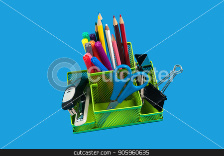 To use this stock image in your creative project, please select the size you need over to the right and click the "Add to Cart" button.
Your downloaded image will come with the Cutcaster watermark removed so don’t worry about the watermark you see on this page. green empty pencil holder on an orange surface stock photo, green pencil holder full of felt pens, pencils, scissors and educational supplies standing on the blue background. concept of office or school supplies by Oleh