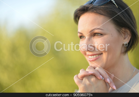 To use this stock image in your creative project, please select the size you need over to the right and click the "Add to Cart" button.
Your downloaded image will come with the Cutcaster watermark removed so don’t worry about the watermark you see on this page. Beautiful young woman resting stock photo, Beautiful young woman resting in summer park by Ruslan Huzau
