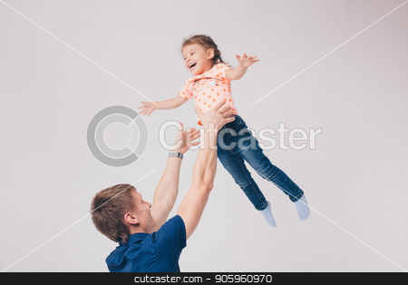 To use this stock image in your creative project, please select the size you need over to the right and click the "Add to Cart" button.
Your downloaded image will come with the Cutcaster watermark removed so don’t worry about the watermark you see on this page. Dad raised his daughter in his arms on a white background. Girl in fly stock photo, Dad raised his daughter in his arms on a white background. Girl in fly by aaalll3110