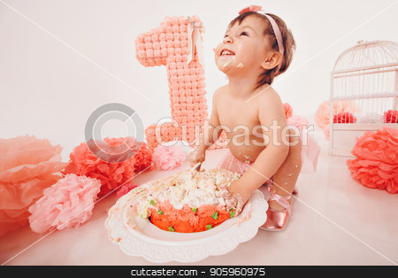 To use this stock image in your creative project, please select the size you need over to the right and click the "Add to Cart" button.
Your downloaded image will come with the Cutcaster watermark removed so don’t worry about the watermark you see on this page. a little girl eats cake with her hands. The baby was covered in food. isolated white background. birthday party stock photo, a little girl eats cake with her hands. The baby was covered in food. isolated white background. birthday party by aaalll3110