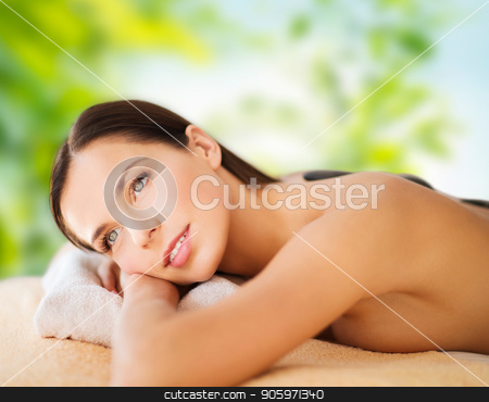 To use this stock image in your creative project, please select the size you need over to the right and click the "Add to Cart" button.
Your downloaded image will come with the Cutcaster watermark removed so don’t worry about the watermark you see on this page. beautiful woman having hot stone therapy at spa stock photo, wellness, spa and beauty concept - beautiful woman having hot stone therapy over green natural background by Syda Productions
