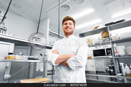 Happy Male Chef Cook At Restaurant Kitchen Stock Photo