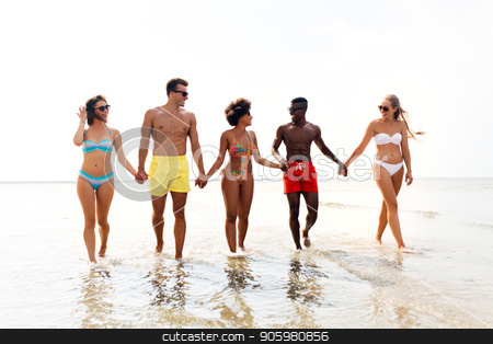 To use this stock image in your creative project, please select the size you need over to the right and click the "Add to Cart" button.
Your downloaded image will come with the Cutcaster watermark removed so don’t worry about the watermark you see on this page. happy friends walking along summer beach stock photo, friendship, summer holidays and people concept - happy friends walking along beach by Syda Productions
