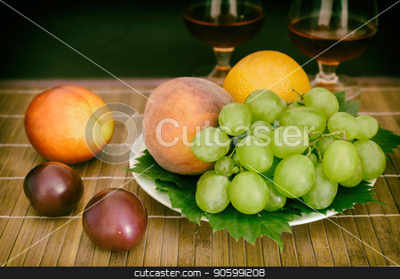 To use this stock image in your creative project, please select the size you need over to the right and click the "Add to Cart" button.
Your downloaded image will come with the Cutcaster watermark removed so don’t worry about the watermark you see on this page. Still life: wine by the glass and fruit. stock photo, Still life: on the table on a plate are fruits, next to two glasses of wine. by Georgina198