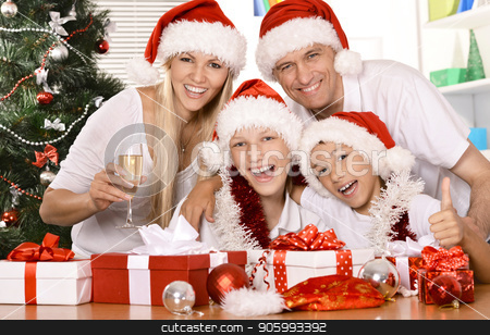 To use this stock image in your creative project, please select the size you need over to the right and click the "Add to Cart" button.
Your downloaded image will come with the Cutcaster watermark removed so don’t worry about the watermark you see on this page. big happy family in santa hats stock photo, big happy family at new years eve posing in santa hats with gifts by Ruslan Huzau