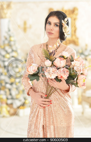 To use this stock image in your creative project, please select the size you need over to the right and click the "Add to Cart" button.
Your downloaded image will come with the Cutcaster watermark removed so don’t worry about the watermark you see on this page. Portrait of beautiful young woman with flowers stock photo, Portrait of beautiful young woman with flowers posing in room decorated to Christmas holiday by Ruslan Huzau