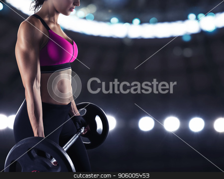 To use this stock image in your creative project, please select the size you need over to the right and click the "Add to Cart" button.
Your downloaded image will come with the Cutcaster watermark removed so don’t worry about the watermark you see on this page. Athletic woman training biceps at the gym stock photo, Athletic muscular woman training biceps with barbell at the gym by Federico Caputo