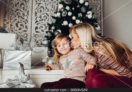To use this stock image in your creative project, please select the size you need over to the right and click the "Add to Cart" button.
Your downloaded image will come with the Cutcaster watermark removed so don’t worry about the watermark you see on this page. Mother and child hugging white teddy bear and posing stock photo, Front view of cute family sitting together on stairs, looking at camera and smiling at christmas. Beautiful mother and child hugging big white teddy bear. Concept of new year atmosphere. by studiolucky