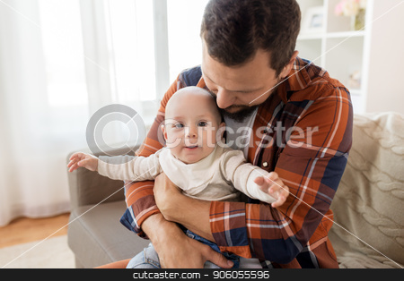 To use this stock image in your creative project, please select the size you need over to the right and click the "Add to Cart" button.
Your downloaded image will come with the Cutcaster watermark removed so don’t worry about the watermark you see on this page. close up of father with little baby boy at home stock photo, family, parenthood and people concept - happy father with little baby boy at home by Syda Productions