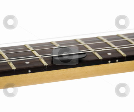 To use this stock image in your creative project, please select the size you need over to the right and click the "Add to Cart" button.
Your downloaded image will come with the Cutcaster watermark removed so don’t worry about the watermark you see on this page. Guitar pic in strings stock photo, Guitar pic in strings by John Teeter