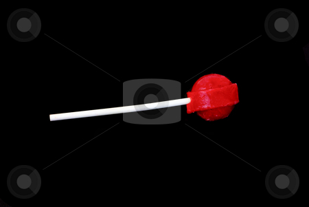 To use this stock image in your creative project, please select the size you need over to the right and click the "Add to Cart" button.
Your downloaded image will come with the Cutcaster watermark removed so don’t worry about the watermark you see on this page. Red lollipop on black stock photo, Red lollipop on black background by John Teeter
