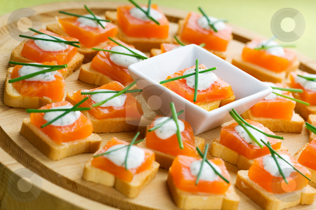 To use this stock image in your creative project, please select the size you need over to the right and click the "Add to Cart" button.
Your downloaded image will come with the Cutcaster watermark removed so don’t worry about the watermark you see on this page. Appetizers stock photo, Delicious appetizers with smoked salmon and dill sauce by Tommy Maenhout