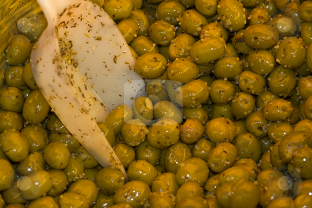 To use this stock image in your creative project, please select the size you need over to the right and click the "Add to Cart" button.
Your downloaded image will come with the Cutcaster watermark removed so don’t worry about the watermark you see on this page. Olives stock photo, by Wolfgang Heidasch