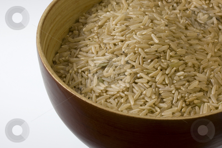 To use this stock image in your creative project, please select the size you need over to the right and click the "Add to Cart" button.
Your downloaded image will come with the Cutcaster watermark removed so don’t worry about the watermark you see on this page. Long brown rice stock photo, A wooden bowl of long grained brown rice against white background by Marek Uliasz
