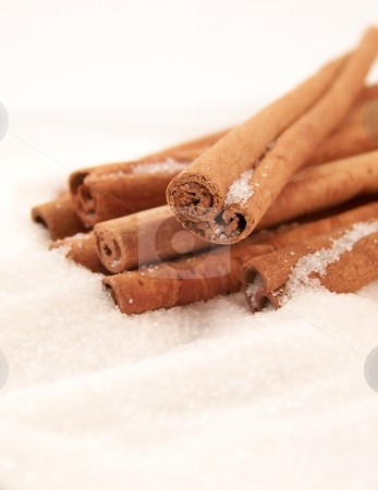 To use this stock image in your creative project, please select the size you need over to the right and click the "Add to Cart" button.
Your downloaded image will come with the Cutcaster watermark removed so don’t worry about the watermark you see on this page. Cinnamon Sticks and Sugar stock photo, Vertical image of cinnamon sticks piled in white granulated sugar, viewed at an angle. by Jill Oliver
