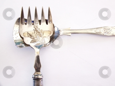 To use this stock image in your creative project, please select the size you need over to the right and click the "Add to Cart" button.
Your downloaded image will come with the Cutcaster watermark removed so don’t worry about the watermark you see on this page. Antique Fork and Antique Sugar Spoon stock photo, Image of an antique pickle fork and antique sugar spoon laying together toward top left portion of the image. Horizontal orientation. by Jill Oliver