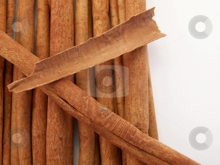 To use this stock image in your creative project, please select the size you need over to the right and click the "Add to Cart" button.
Your downloaded image will come with the Cutcaster watermark removed so don’t worry about the watermark you see on this page. Cinnamon Sticks stock photo, Image of a pile of cinnamon sticks, with a broken piece placed on top. by Jill Oliver