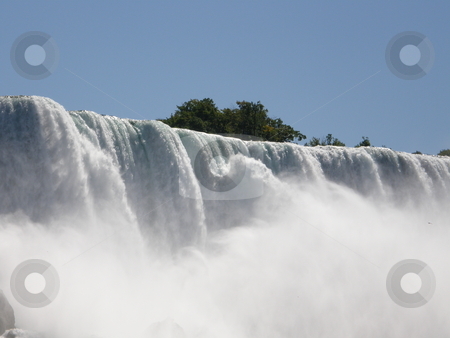 To use this stock image in your creative project, please select the size you need over to the right and click the "Add to Cart" button.
Your downloaded image will come with the Cutcaster watermark removed so don’t worry about the watermark you see on this page. Niagara Falls stock photo, Niagara Falls - border of USA by Ritu Jethani