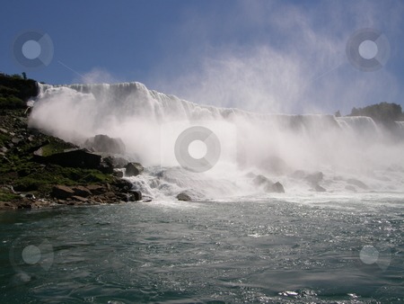 To use this stock image in your creative project, please select the size you need over to the right and click the "Add to Cart" button.
Your downloaded image will come with the Cutcaster watermark removed so don’t worry about the watermark you see on this page. Niagara Falls stock photo, Niagara Falls - border of USA by Ritu Jethani