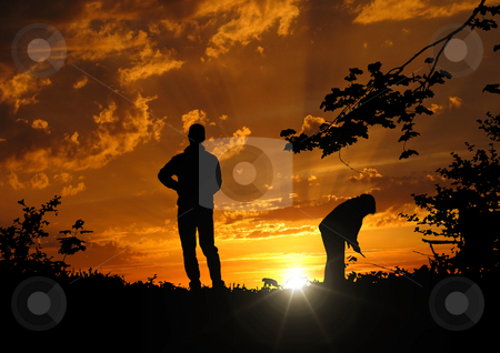 To use this stock image in your creative project, please select the size you need over to the right and click the "Add to Cart" button.
Your downloaded image will come with the Cutcaster watermark removed so don’t worry about the watermark you see on this page. Sunset stock photo, A photography of a sunset with two people by Markus Gann