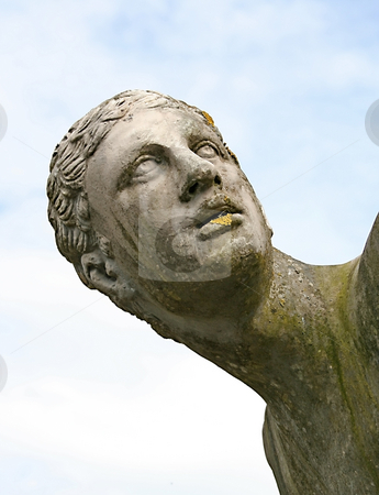 To use this stock image in your creative project, please select the size you need over to the right and click the "Add to Cart" button.
Your downloaded image will come with the Cutcaster watermark removed so don’t worry about the watermark you see on this page. Stone head stock photo, A photography of an old stone head by Markus Gann
